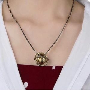 Astronomical Ring and Necklace golden Sphere